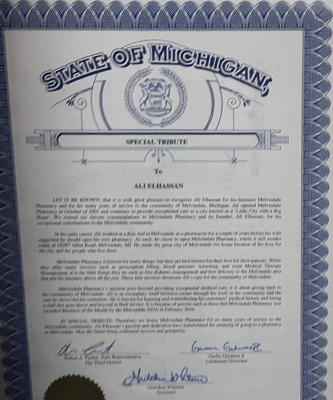 State of Michigan Special Tribute to Ali Elhassan, framed, with the State seal